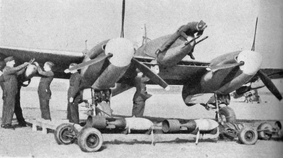 Loading bombs onto a Whirlybomber.